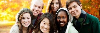 group of six young people smiling l children dentist prosper tx
