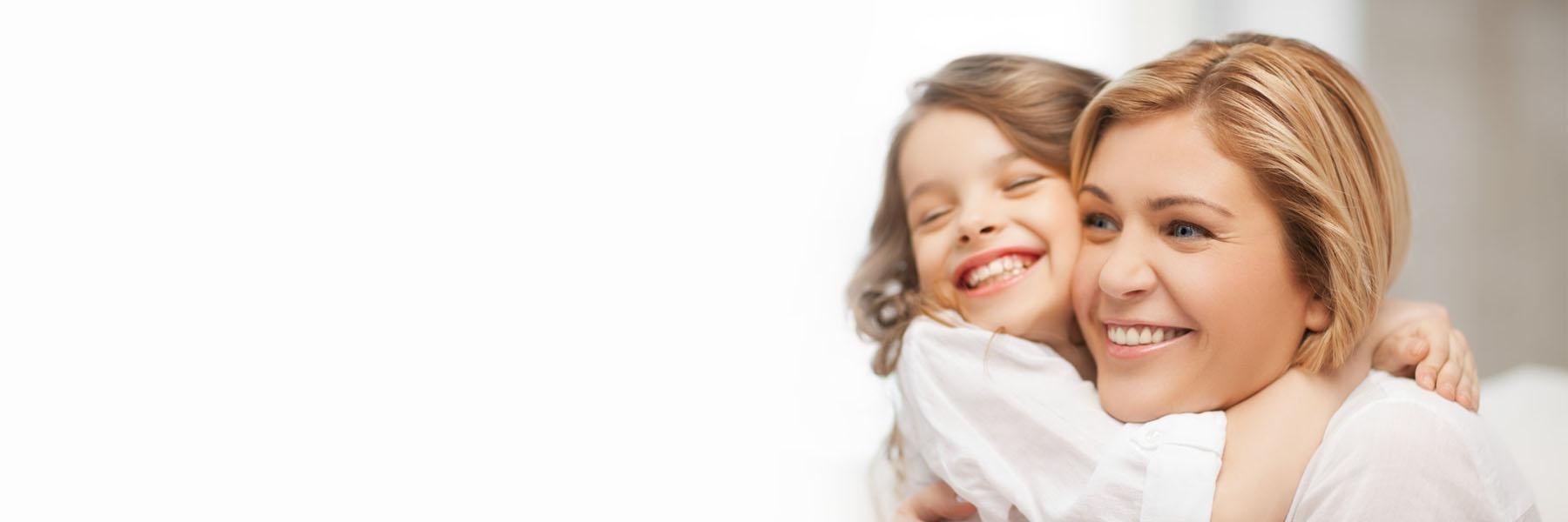 blonde woman with daughter l pediatric dentistry prosper tx
