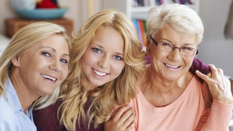 three woman smiling