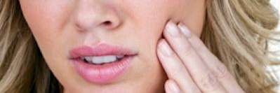 A lady with dental pain in Prosper, TX 