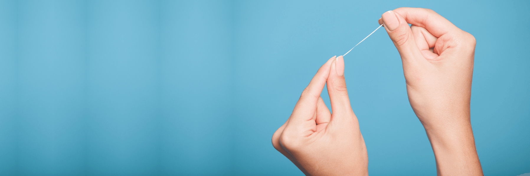 close up of dental floss l Preventive Dentistry in Prosper TX