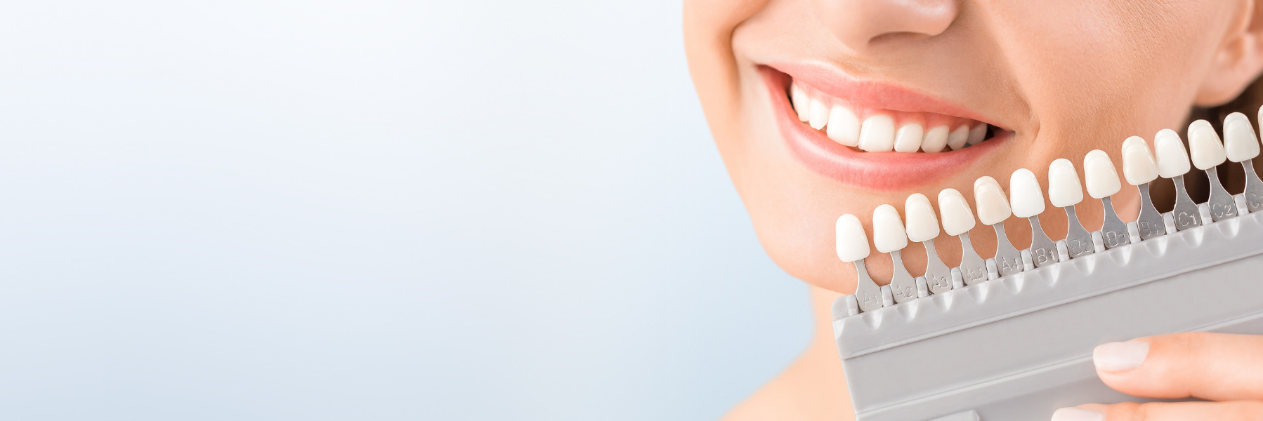 woman picking teeth whitening shade l teeth whitening prosper TX