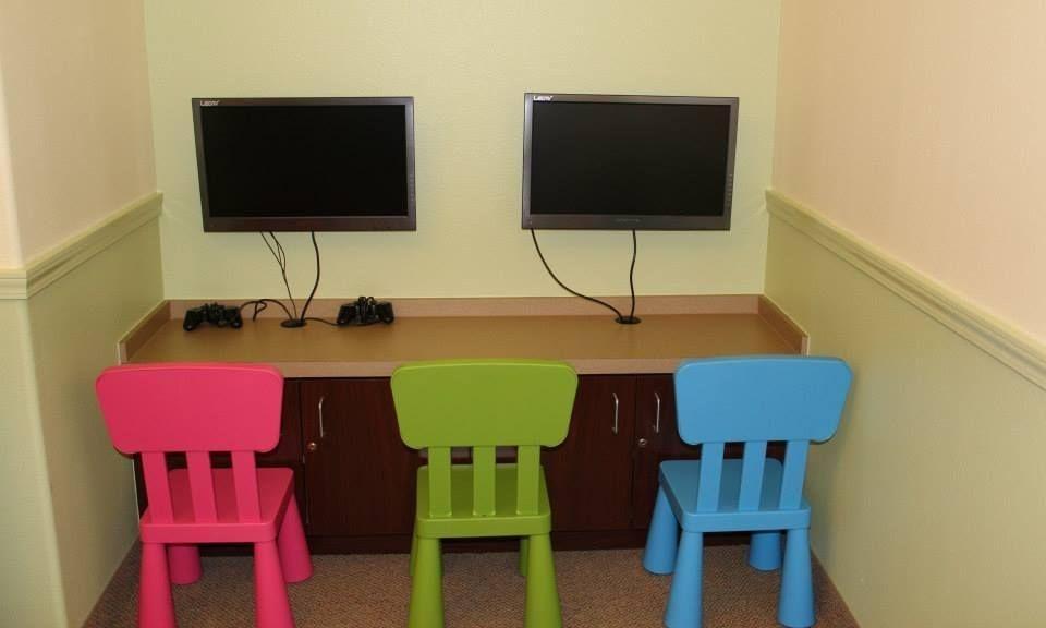 Video game station in kids waiting area at childrens dentist in Prosper TX